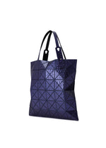 A detail shot of the BAO BAO ISSEY MIYAKE META KAIJU tote.
