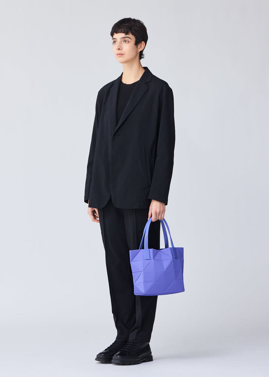A model wears the BAO BAO ISSEY MIYAKE TRACK 0.