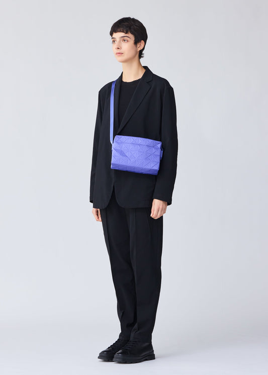 A model wears the BAO BAO ISSEY MIYAKE TRACK shoulder bag.