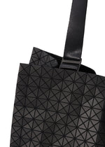 A detail shot of the BAO BAO ISSEY MIYAKE CART tote.