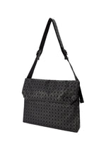 A detail shot of the BAO BAO ISSEY MIYAKE FROGGY shoulder bag.