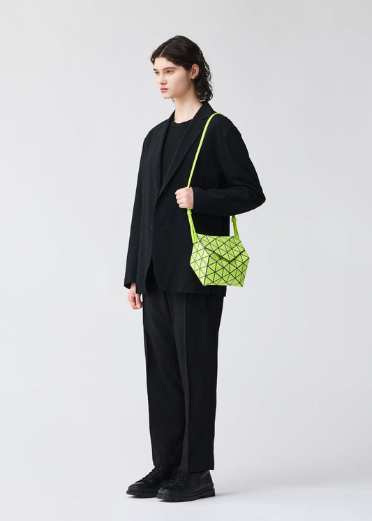 A model wears the BAO BAO ISSEY MIYAKE TORSO shoulder bag.