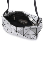 A detail shot of the BAO BAO ISSEY MIYAKE CARTON shoulder bag.