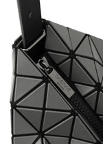 A detail shot of the BAO BAO ISSEY MIYAKE VALLEY handbag.