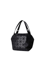 A detail shot of the BAO BAO ISSEY MIYAKE BOSTON hand bag.