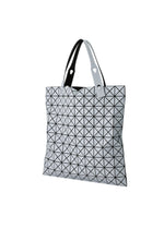 A detail shot of the BAO BAO ISSEY MIYAKE PRISM FROST tote.