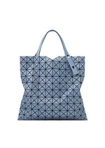 A product shot of the BAO BAO ISSEY MIYAKE PRISM DENIM tote in blue.
