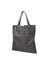 A detail shot of the BAO BAO ISSEY MIYAKE PRISM DENIM tote.