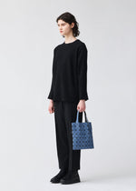 A model wears the BAO BAO ISSEY MIYAKE PRISM DENIM prism-denim-tote-black-1.