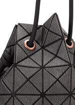 A detail shot of the BAO BAO ISSEY MIYAKE WRING DENIM shoulder bag.