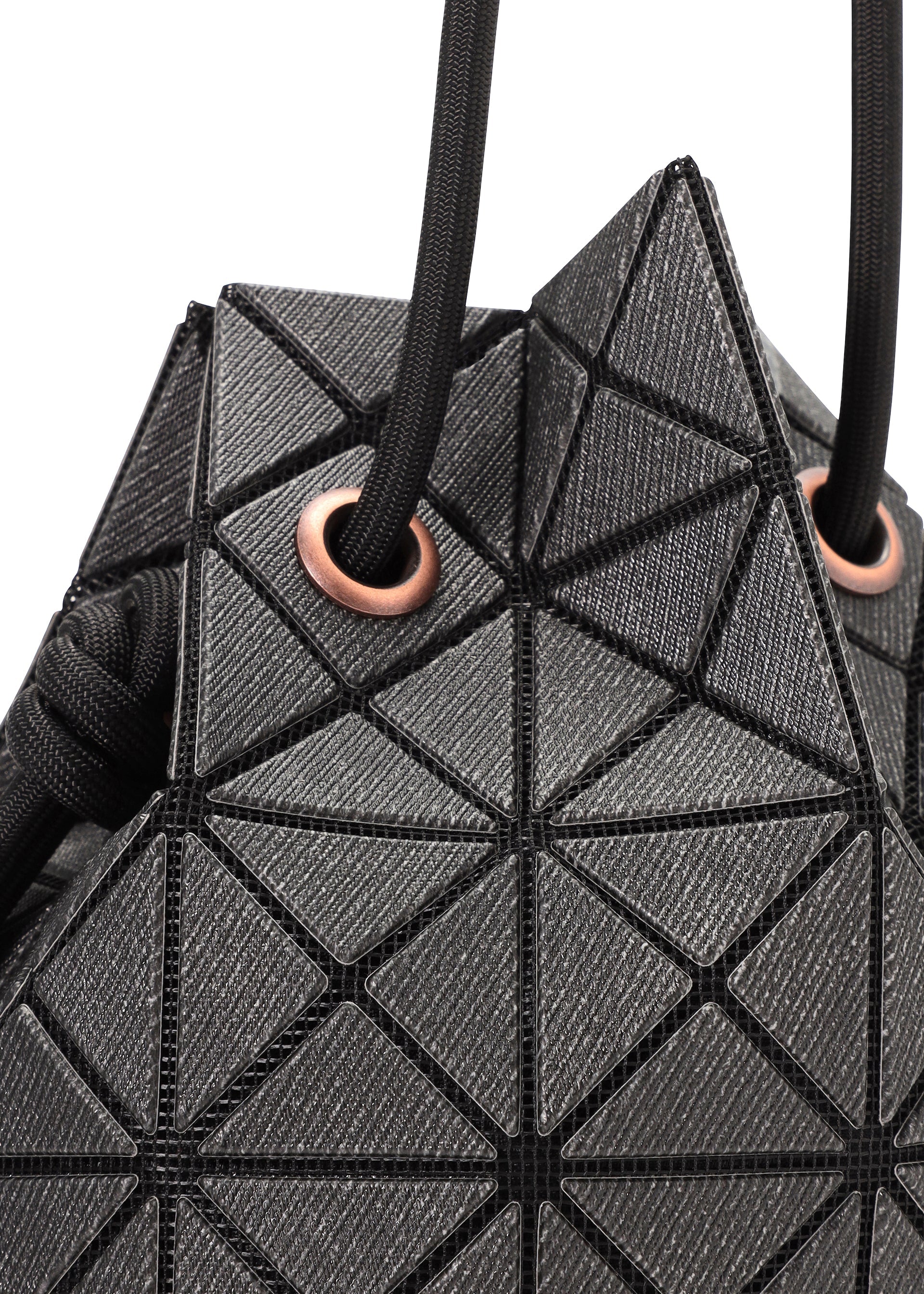 A detail shot of the BAO BAO ISSEY MIYAKE WRING DENIM shoulder bag.