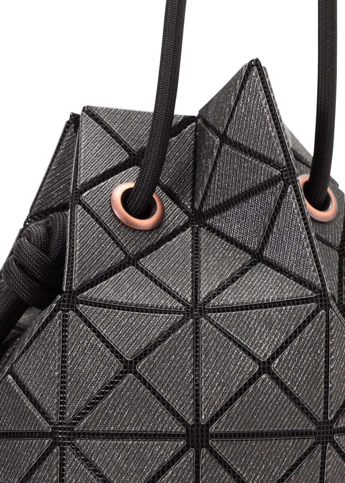 A detail shot of the BAO BAO ISSEY MIYAKE WRING DENIM shoulder bag.