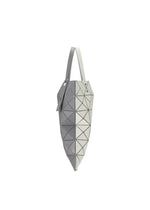 A detail shot of the BAO BAO ISSEY MIYAKE LUCENT W COLOR tote.
