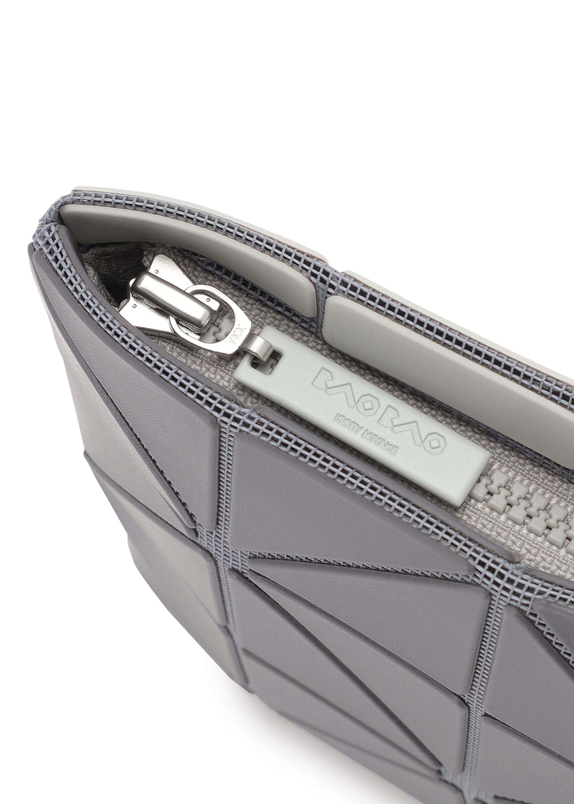 A detail shot of the BAO BAO ISSEY MIYAKE LUCENT W COLOR pouch.