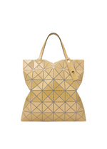 A product shot of the BAO BAO ISSEY MIYAKE LUCENT METALLIC tote in ochre (57).