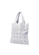 A detail shot of the BAO BAO ISSEY MIYAKE LUCENT METALLIC tote.