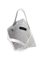 A detail shot of the BAO BAO ISSEY MIYAKE LUCENT METALLIC tote.