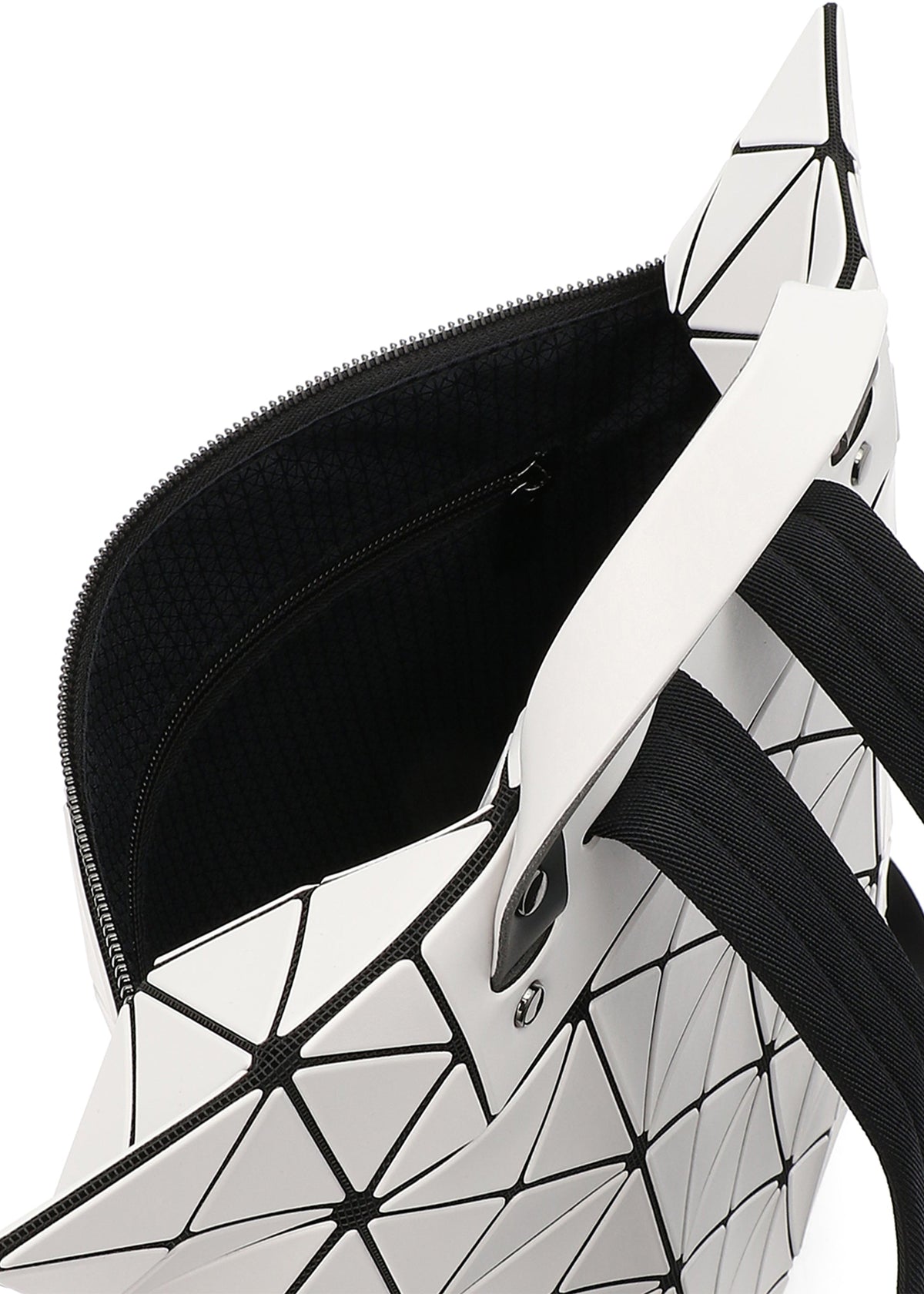 A detail shot of the BAO BAO ISSEY MIYAKE FLAT PACK backpack.