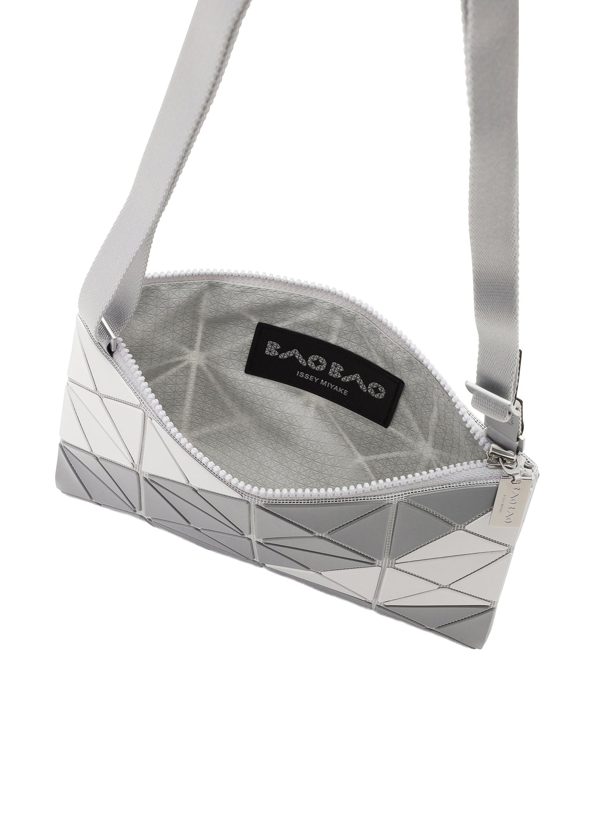 A detail shot of the BAO BAO ISSEY MIYAKE SIGN shoulder bag.