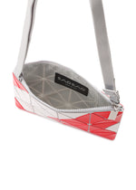 A detail shot of the BAO BAO ISSEY MIYAKE SIGN shoulder bag.