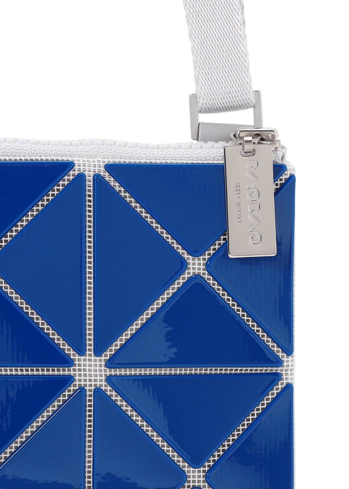 A detail shot of the BAO BAO ISSEY MIYAKE SIGN shoulder bag.