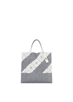 A detail shot of the BAO BAO ISSEY MIYAKE SIGN tote.