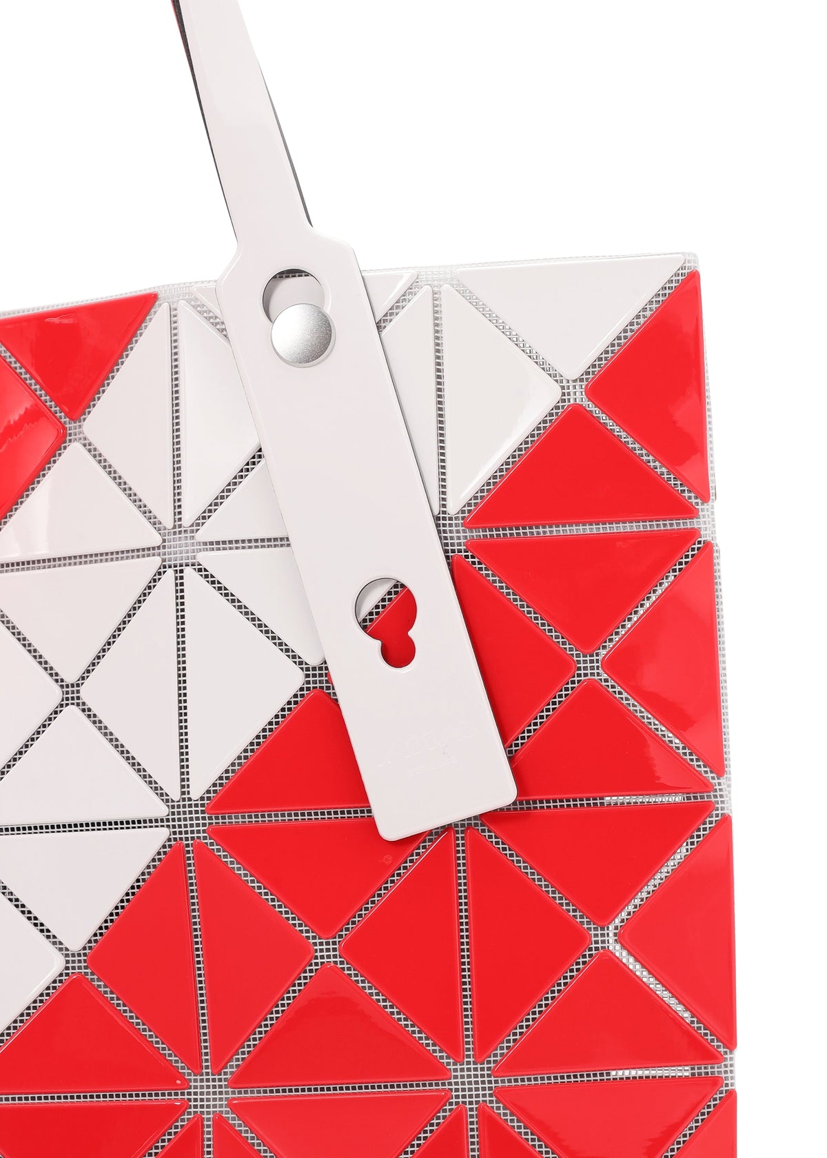 A detail shot of the BAO BAO ISSEY MIYAKE SIGN tote.