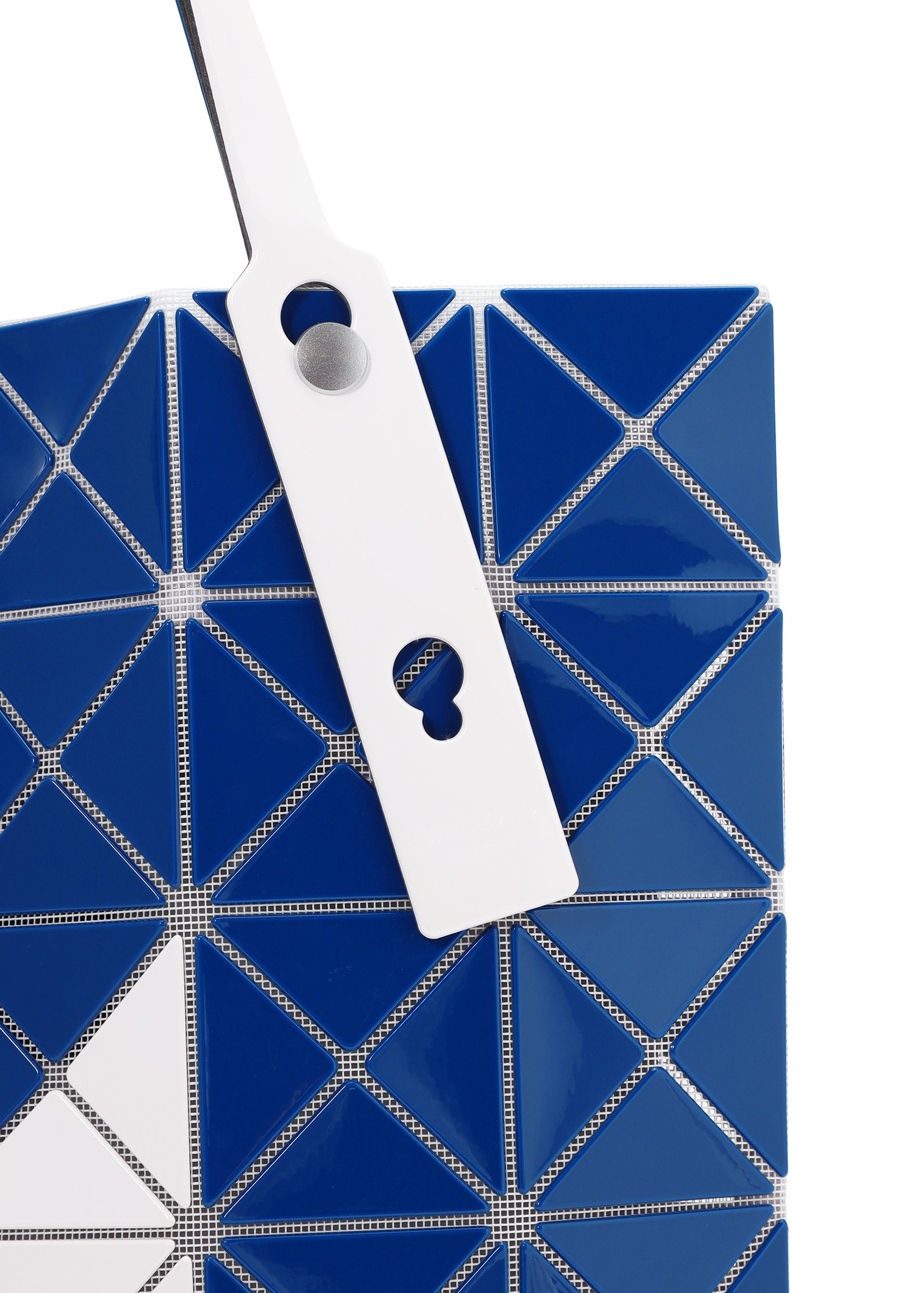 A detail shot of the BAO BAO ISSEY MIYAKE SIGN tote.