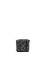 A detail shot of the BAO BAO ISSEY MIYAKE CITY pouch.