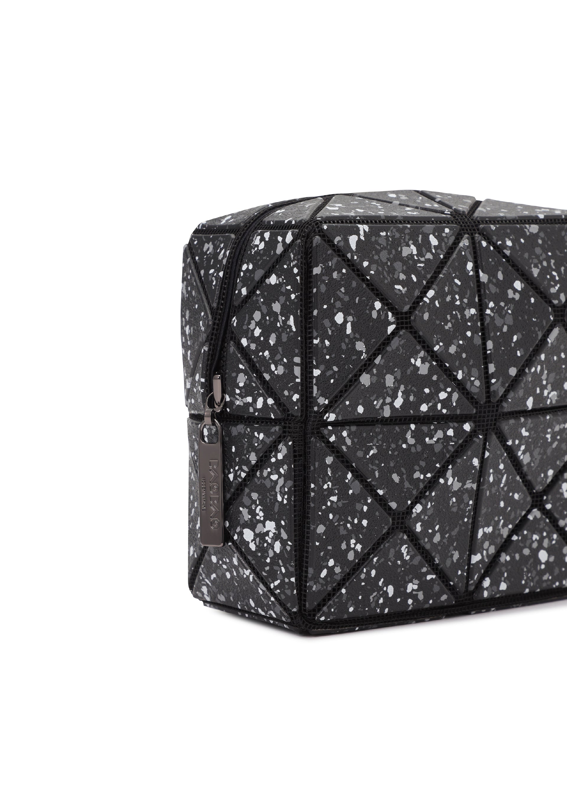 A detail shot of the BAO BAO ISSEY MIYAKE CITY pouch.