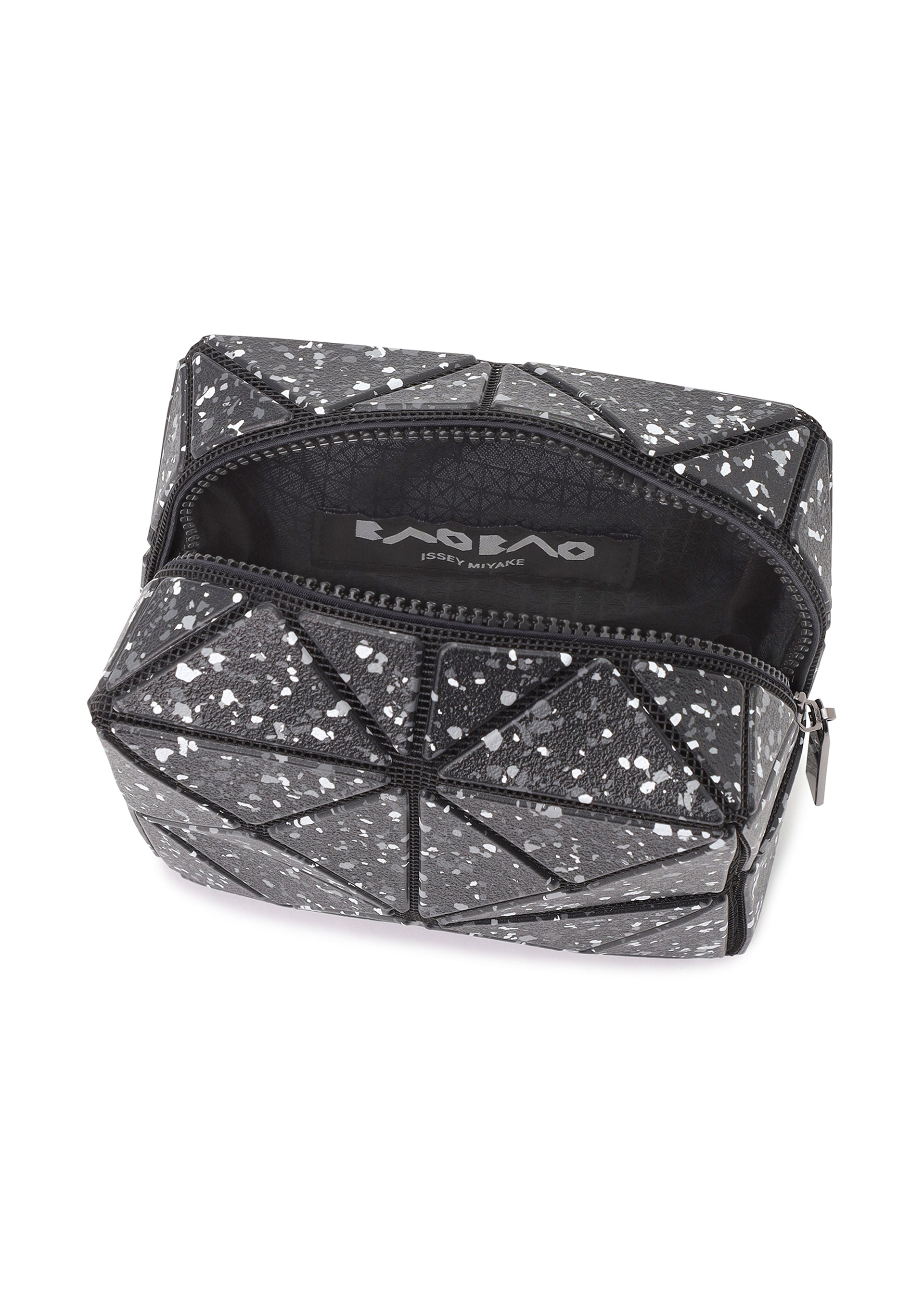 A detail shot of the BAO BAO ISSEY MIYAKE CITY pouch.