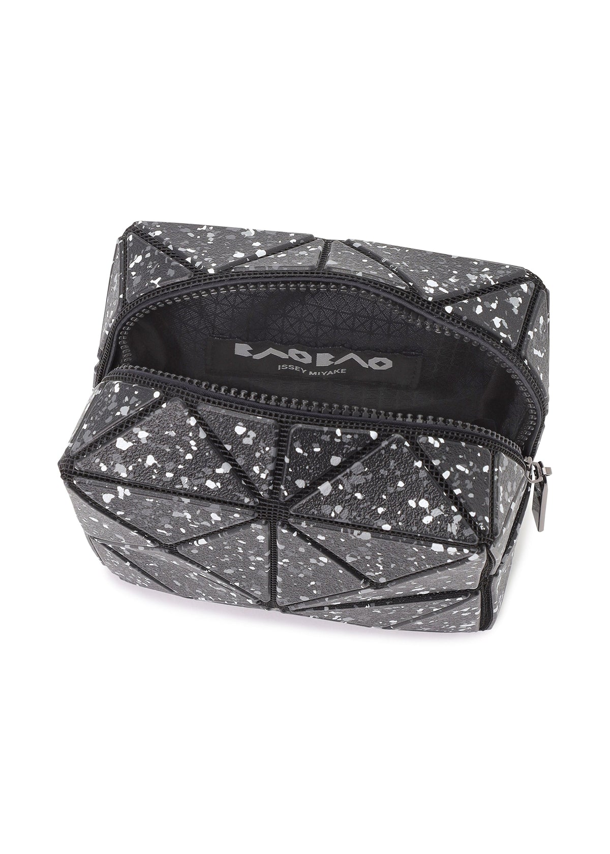 A detail shot of the BAO BAO ISSEY MIYAKE CITY pouch.
