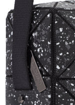A detail shot of the BAO BAO ISSEY MIYAKE CITY shoulder bag.