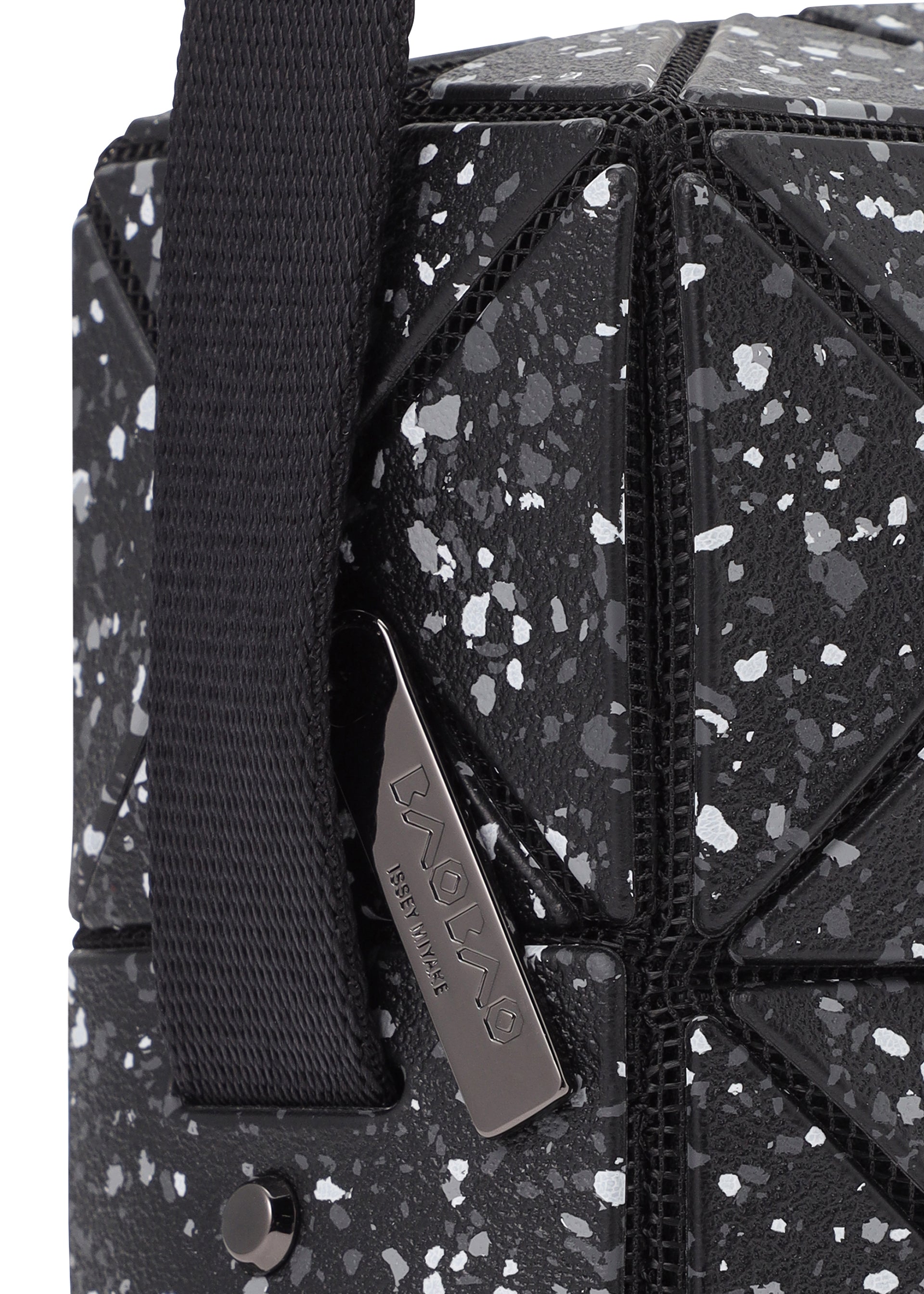 A detail shot of the BAO BAO ISSEY MIYAKE CITY shoulder bag.