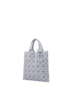 A detail shot of the BAO BAO ISSEY MIYAKE MINIATURE tote.