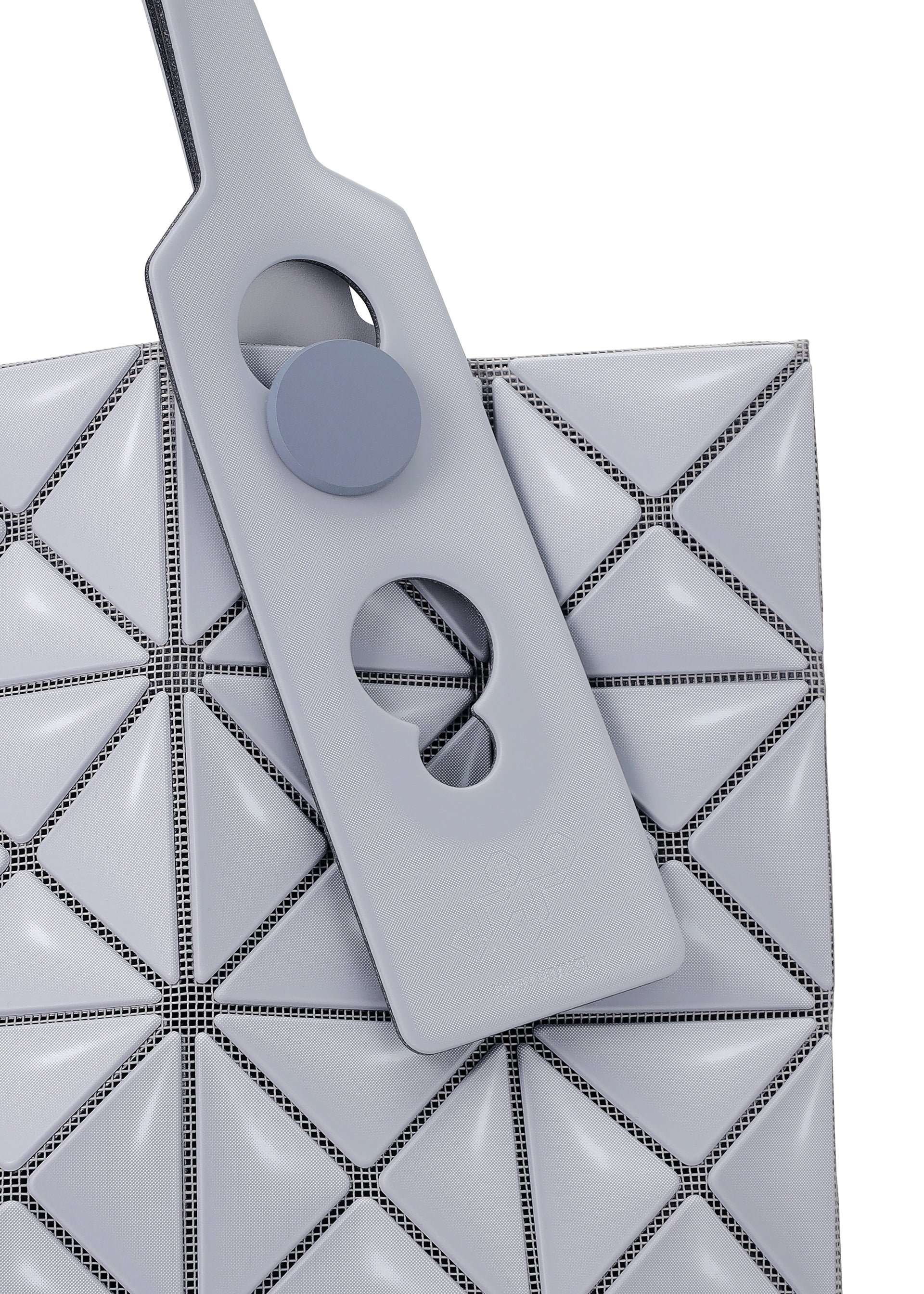 A detail shot of the BAO BAO ISSEY MIYAKE MINIATURE tote.