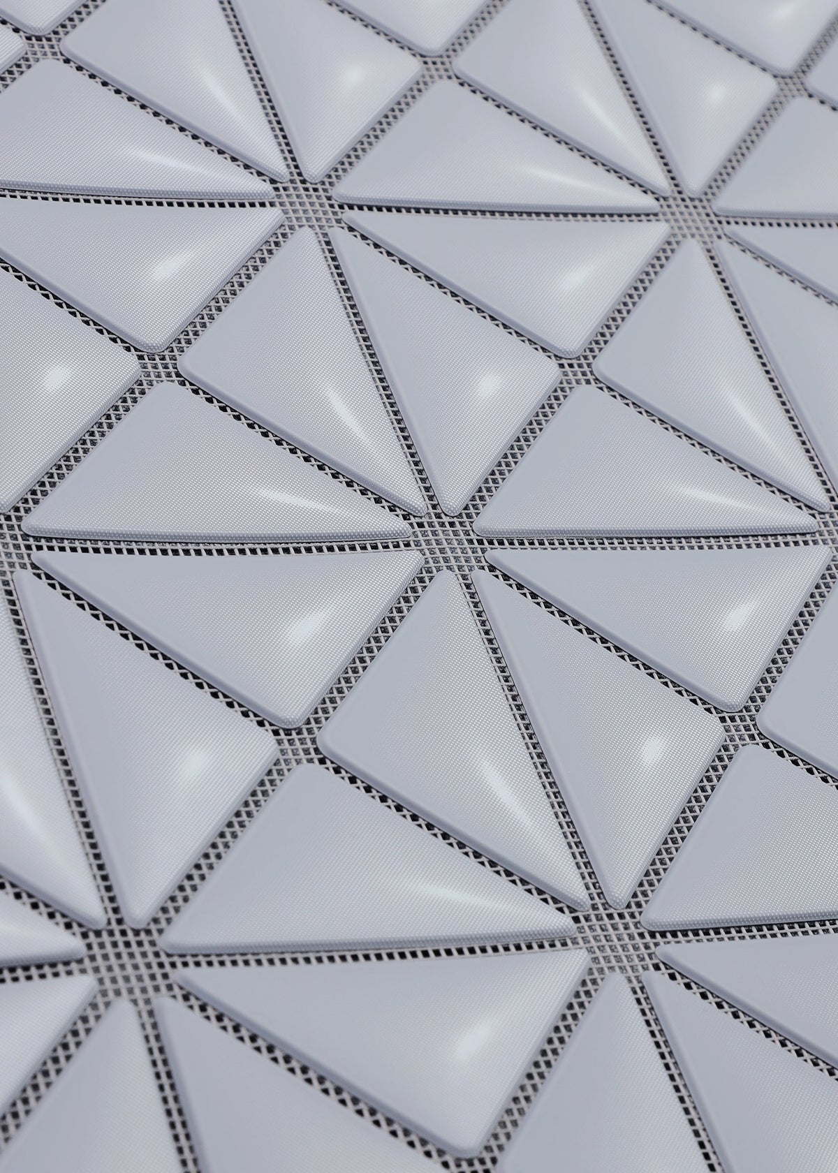 A detail shot of the BAO BAO ISSEY MIYAKE MINIATURE tote.