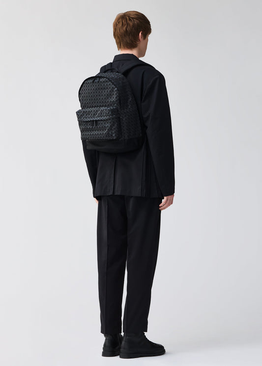 A model wears the BAO BAO ISSEY MIYAKE DAYPACK backpack.