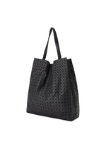 A detail shot of the BAO BAO ISSEY MIYAKE CART S tote.