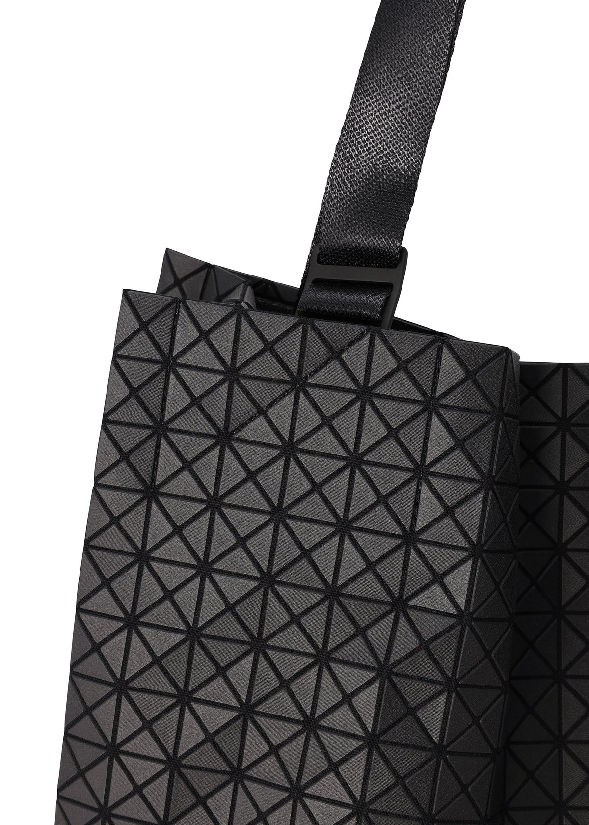 A detail shot of the BAO BAO ISSEY MIYAKE CART S tote.