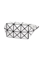 A detail shot of the BAO BAO ISSEY MIYAKE PRISM pouch.