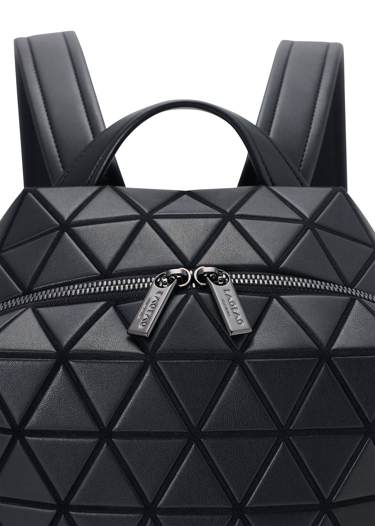 A detail shot of the BAO BAO ISSEY MIYAKE HEXAGON backpack.