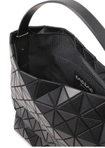 A detail shot of the BAO BAO ISSEY MIYAKE VALLEY handbag.
