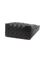 A detail shot of the BAO BAO ISSEY MIYAKE VALLEY handbag.