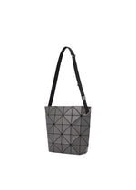 A detail shot of the BAO BAO ISSEY MIYAKE BLOCKY shoulder bag.