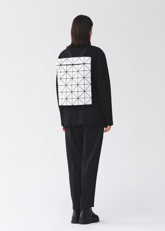 A model wears the BAO BAO ISSEY MIYAKE BLOCKY blocky-adjustable-backpack-matte-black.