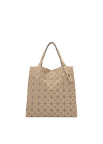 A product shot of the BAO BAO ISSEY MIYAKE PRISM PLUS tote in ocher.