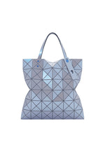 A product shot of the BAO BAO ISSEY MIYAKE LUCENT ONE-TONE tote in blue gray.