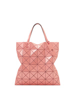 A product shot of the BAO BAO ISSEY MIYAKE LUCENT ONE-TONE tote in sunset coral.
