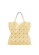 A product shot of the BAO BAO ISSEY MIYAKE LUCENT ONE-TONE tote in sunlight yellow.